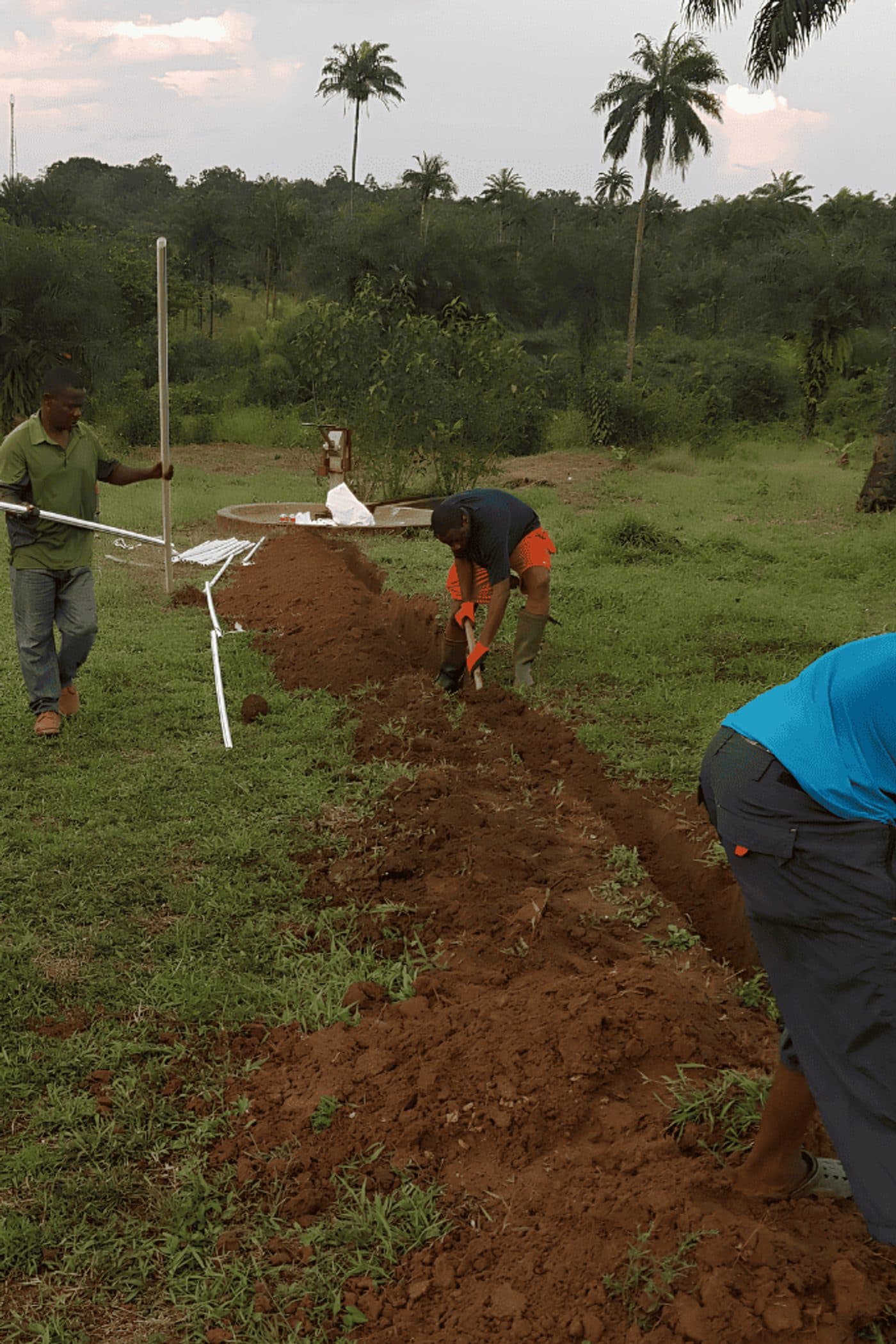 Digging the trench for the water project in Tieni, Liberia
